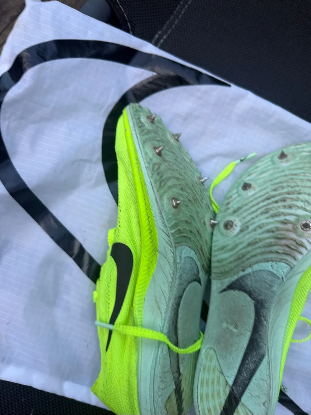 Nike Bright spikes, come with shoes bag